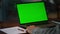 Green screen laptop computer closeup. Unknown senior man having video call