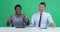 Green screen, man and woman in news broadcast, talk show presenter and journalist conversation in tv studio. Diversity