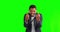 Green screen, middle finger and happy black man excited, funny and a goofy joke by businessman in studio background