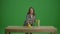 Green Screen.A Smiling Young Woman Housewife Cleaning the Table.