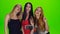 Green screen studio. Three girl model pose for selfie photo