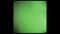 Green screen of a Vintage TV. Old TV chromakey. Green screen with rounded edges and damaged film tape. Retro Film Effect