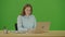 Green Screen Young Pretty Motivated Student Typing on Laptop Working on Internet