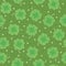 Green seamless background with shamrock