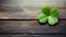 Green shamrock, real four-leaf clover on wooden background. AI Generated