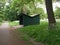 Green Shed in the Park Forest