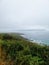 Green shore on a picturesque seascape background in Cangas, Pontevedra