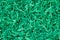 Green shredded paper packaging material background