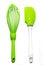 green silicone culinary spatula and whisk Isolated on white background