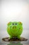 Green smiling piggy bank