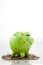 Green smiling piggy bank