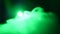 Green smoke on black background