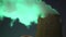 Green smoke from chimney of night industrial cityscape with carbon emissions from factory