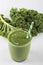 Green smoothie made with kale leaves