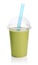 Green smoothie in plastic transparent cup