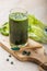 Green smoothie with spirulina. Young barley and chlorella spirulina. Detox superfood