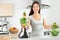 Green smoothie woman making vegetable smoothies
