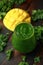 Green smoothies with kale and mango on wooden table