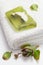 Green soap on white towel