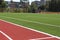 Green soccer field with white markings