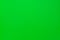 green solid color background with matte texture. Wallpaper design