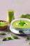 Green Soup. Broccoli Cream Soup with Parmesan and Microgreen. Healthy Vegan Dish. Cream Soup of Green Peas. Bowl With Delicious