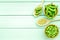 Green soybeans background on mint green wooden desk top view mockup