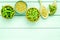 Green soybeans background on mint green wooden desk top view mockup