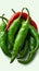 Green and spicy Background adorned with vibrant chili peppers