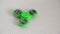 Green spinner in motion