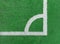 Green sport football field with white marker line