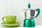 Green spotty mug and moka maker