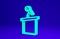 Green Stage stand or debate podium rostrum icon isolated on blue background. Conference speech tribune. Minimalism