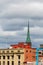 Green Steeple Under Stormy Skies