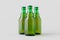 Green steinie beer bottle mockup on a grey background