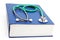 Green stethoscope lying on a thick blue book