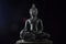 green stone buddha.Hand carved stone Buddha from Thailand.