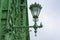 Green streetlamp on white background