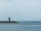 green striped lighthouse in porto bar at the mouth of Porto