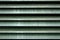 Green striped metal background