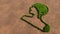 Green summer lawn grass symbol shape on brown soil or earth background, human brain image