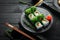 Green sushi. Japanese sushi with Chuka salad. Asian Diet Food.