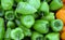 Green sweet juicy peppers background at the food market for sale, healthy raw vegan food