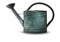 Green tarnished galvanized watering can on white