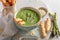 Green and tasty creamy asparagus soup as healthy diet