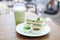 Green Tea Cake in a White Plate, eaten with green tea in the summer to refresh. Selective focus