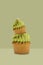 Green tea cupcake on green background, idea minimal concept for new year and christmas holliday