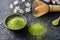 Green tea matcha close-up. Dry green tea. Macro of a match. Powder, match tea. Bamboo Matcha Tea Whisk also know as chasen. japan