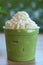 Green tea matcha latte smoothies in coffee cafe
