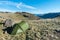 Green tent at Cold Pike in the Lake District, UK, overlooking Great Knott, Browney Gill and Oxendale